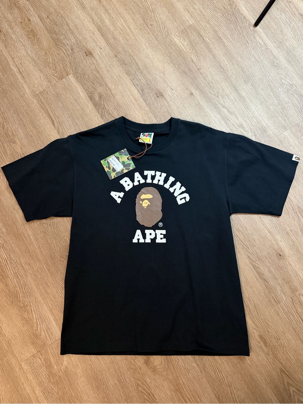 Bape college men’s T-shirt brand new never worn still has tags.